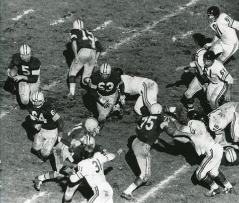 Green Bay Packers Ray Nitschke in action, making tackle vs Chicago