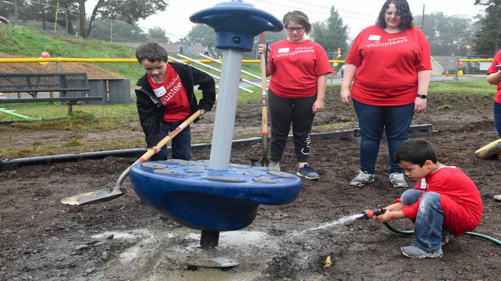 Wells Fargo volunteers brighten playground in Pottsville Area