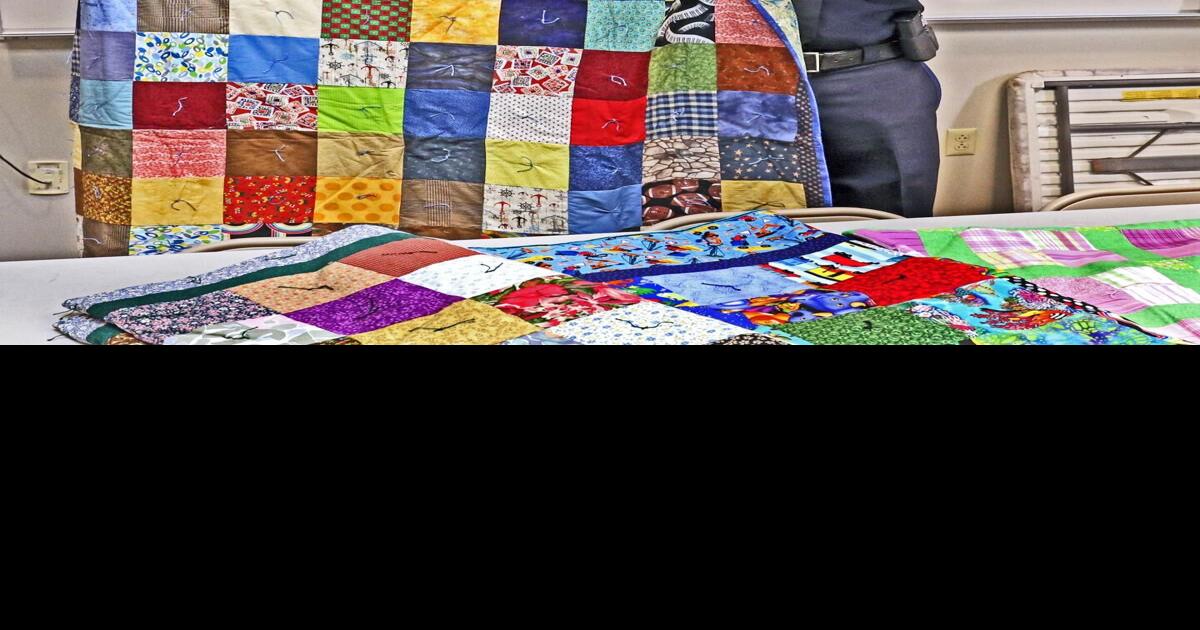 Quilt donation to Hopkinton PD aims to help those in distress Local