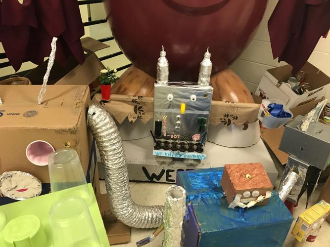 Western Coventry students construct machines from recyclables for Earth