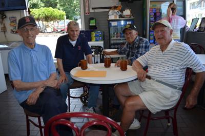 Longtime pals meet weekly at Ray's Poly-Clean to sip coffee, reminisce