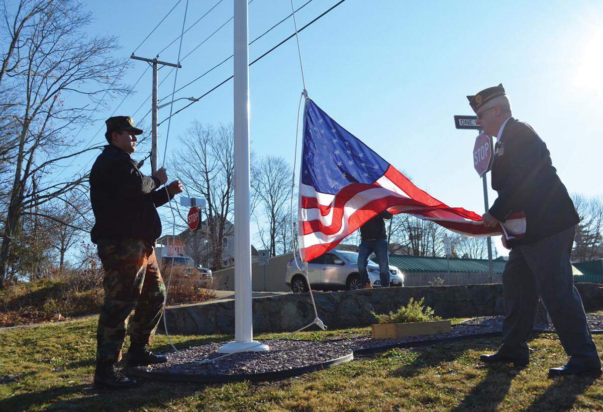 American flag brought to Veterans Square during ceremony Saturday