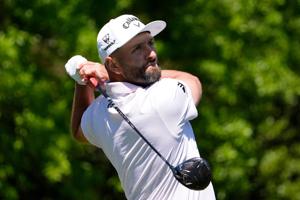 LIV Golf star Jon Rahm, shown here during the 2026 Masters tournament, has settled a dispute over his DP World Tour eligibility.