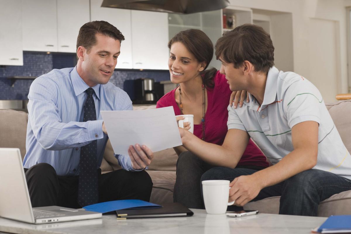 financial planner with young couple