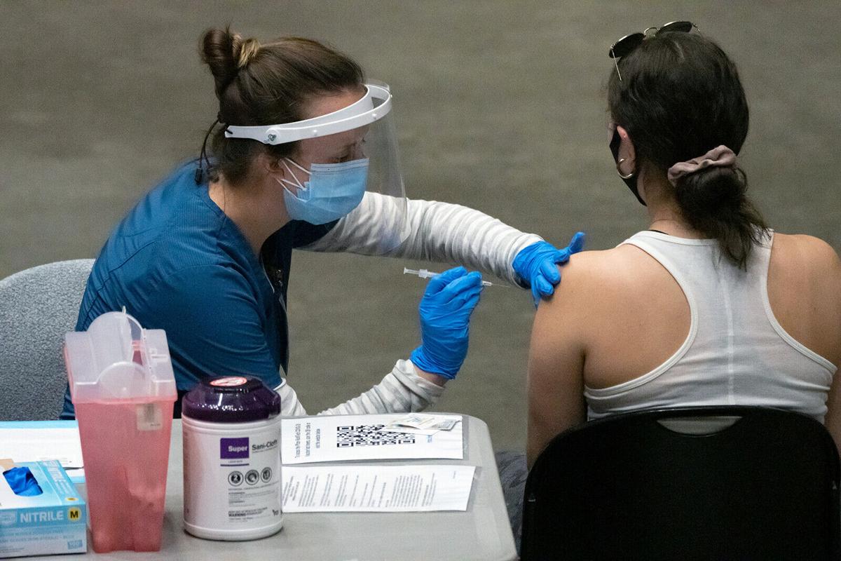 Get fully vaccinated before resuming normal activities, health experts plead with Americans