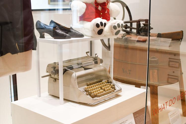 Woman Working At Typewriter by George Marks