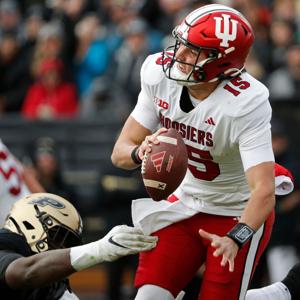 Purdue Boilermakers linebacker Nic Scourton (5) sacks Indiana Hoosiers quarterback Brendan Sorsby (15) during the NCAA football