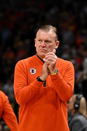Illinois Fighting Illini head coach Brad Underwood reacts in the first half against the Iowa Hawkeyes during an Elite Eight game of the South Region of the men's 2026 NCAA Tournament at Toyota Center.