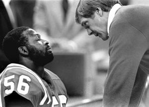 ORG XMIT: New England Patriots and the Chicago Bears in Superbowl XX at the Superdome, New Orleans, LA. January 26, 1986. Bears won 46-10. Patriots head coach Raymond Berry tries to give a comforting word to patriots linebacker #56 Andre Tippett near