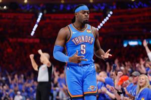 May 18, 2026; Oklahoma City, Oklahoma, USA; Oklahoma City Thunder forward Luguentz Dort (5) celebrates in the third quarter against the San Antonio Spurs during game one of the western conference finals for the 2026 NBA playoffs at Paycom Center.