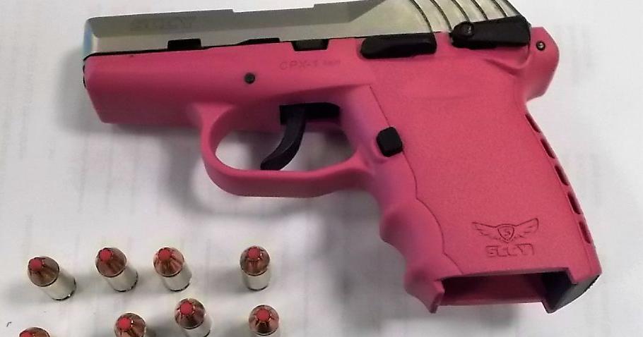 Pink Gun Bullets Hot pink pistol with pink-tipped cartridges confiscated from traveler ...