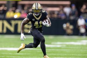 Sep 14, 2025; New Orleans, Louisiana, USA; New Orleans Saints running back Alvin Kamara (41) runs against the San Francisco 49ers during the first half at Caesars Superdome. Mandatory Credit: Stephen Lew-Imagn Images