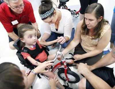 Fundraiser Saturday will help buy tricycles for children with disabilities