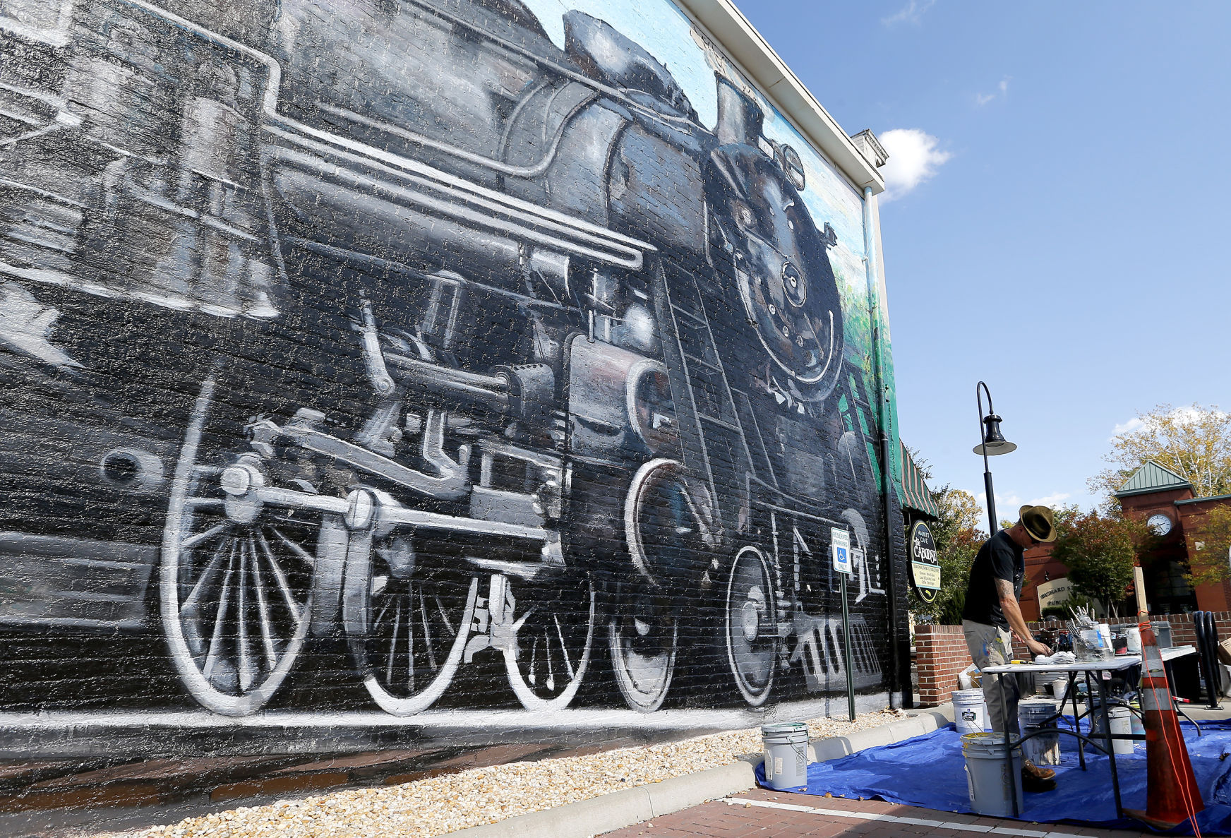 Sprawling train mural honors engineer who left mark on Ashland