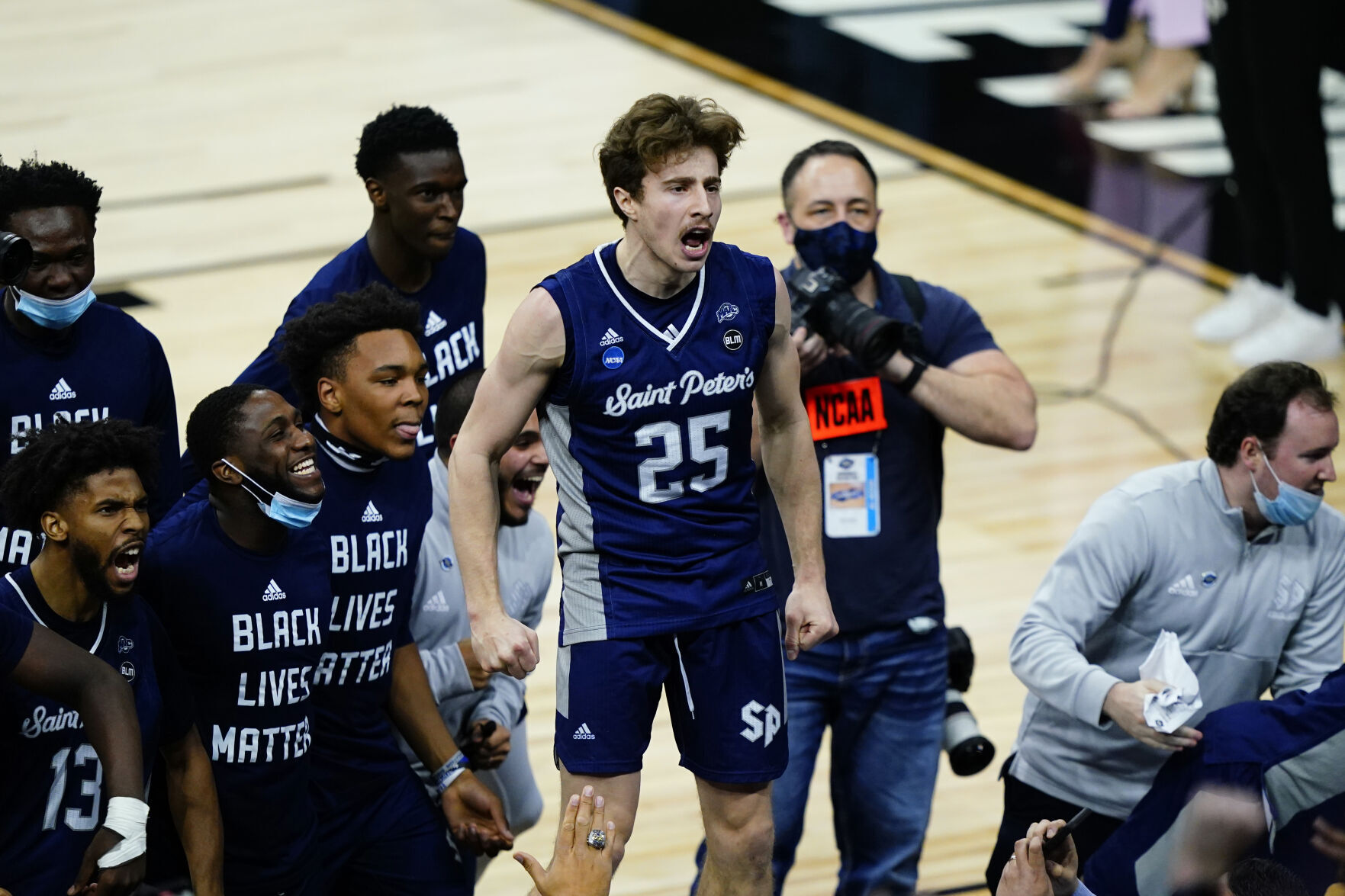 Saint Peter's the people's choice in unlikely NCAA East Regional final against UNC