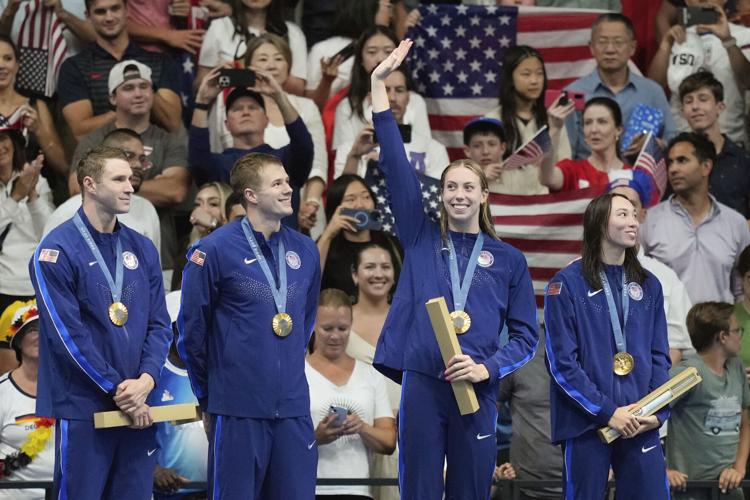 Walsh, Huske lead U.S. 4x100 mixed relay team to world record and gold