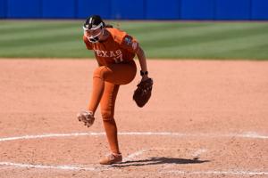 Texas Longhorns pitcher Teagan Kavan (17) celebrates after the second softball game of the day between the University of Texas Longhorns and the Tennessee Lady Volunteers in the Women's College World Series at Devon Park in Oklahoma City, Monday, Jun