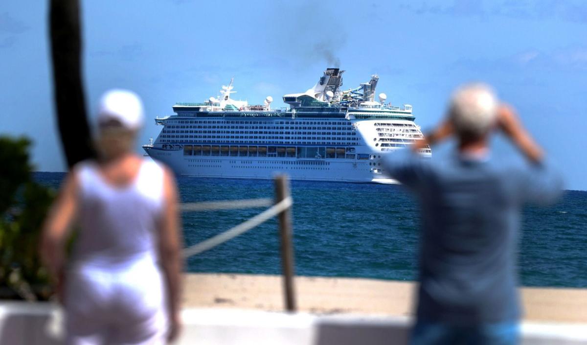 The Royal Caribbean ship Adventure of the Sea sits off Fort Lauderdale beach on Thursday, April 2, 2020. The cruise line's parent company announced Thursday, July 30, 2020, it was dropping "cruises" from its official name to become Royal Caribbean Group. The cruise ships are ready to set sail again after the pandemic shut down its operations.