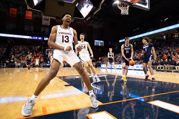 Virginia basketball back on court, honors shooting victims