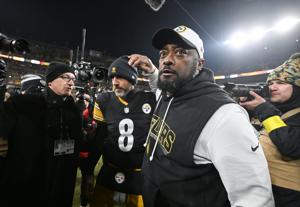 Jan 4, 2026; Pittsburgh, Pennsylvania, USA; Pittsburgh Steelers head coach Mike Tomlin and quarterback Aaron Rodgers (8) celebrate after defeating the Baltimore Ravens at Acrisure Stadium. Mandatory Credit: Barry Reeger-Imagn Images