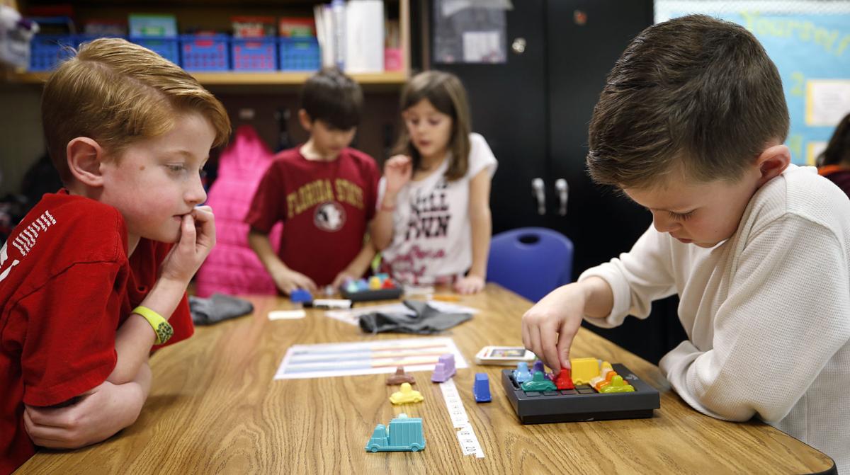 PHOTOS Students learn while playing games News