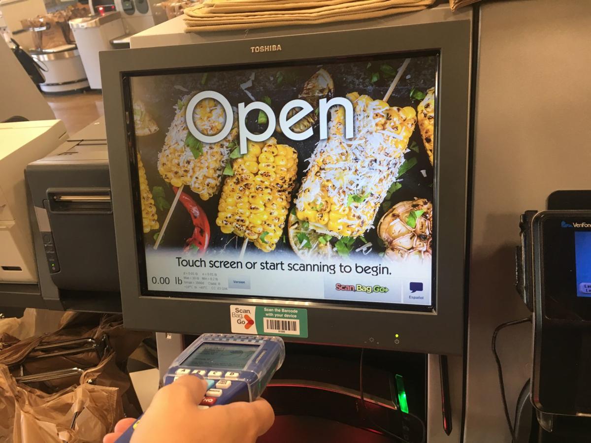 Avoiding the grocery checkout line Kroger debuts self Scan, Bag, Go