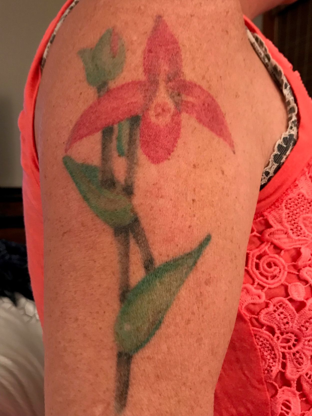 I got to do this orchids on sarahrylee thanks for getting so many tattoos  from me and from getting this cattleya  Tattoos Female tattoo artists  Pink sports bra