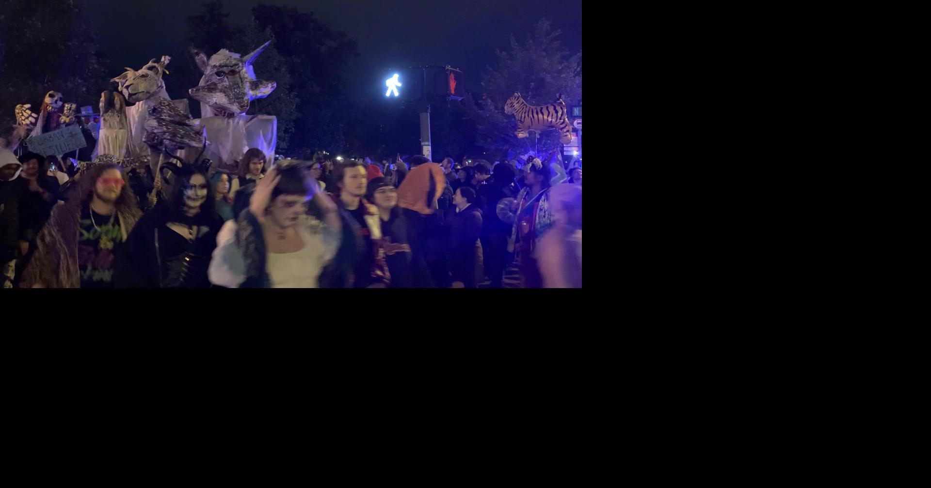People march in the Richmond Halloween Parade