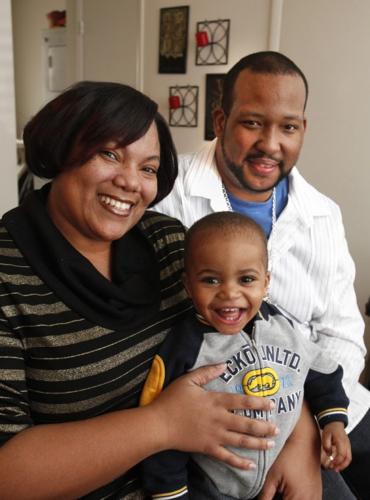 Faces of 2010: 'Baby Henrico' happy with new parents