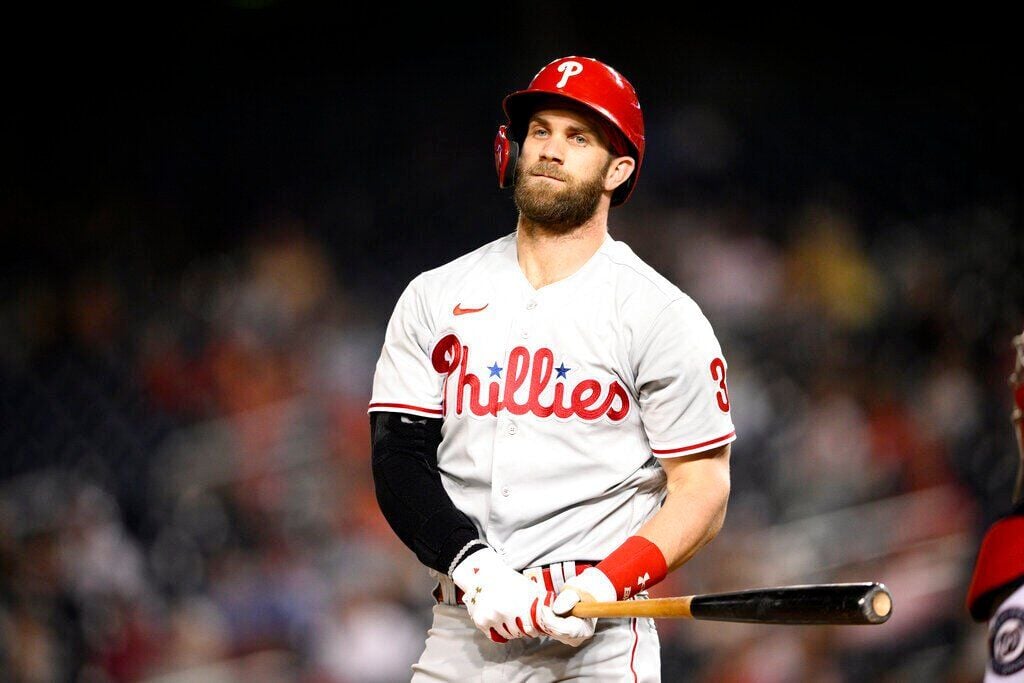 San Diego Padres second baseman Jake Cronenworth throws to first base for  an out in a baseball game against the Philadelphia Phillies, Saturday, June  25, 2022, in San Diego. (AP Photo/Derrick Tuskan