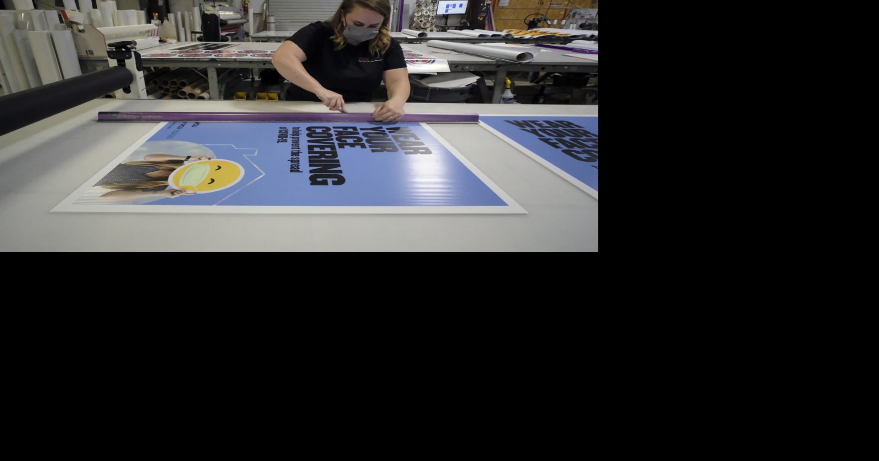 Business is booming for local companies making signs, banners and sneeze  guards