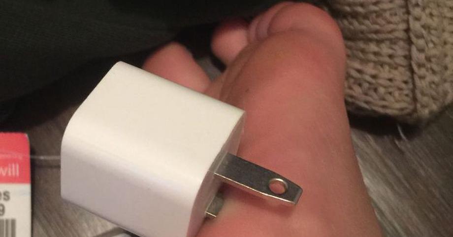 18-year-old gets phone charger stuck in foot because of her messy room
