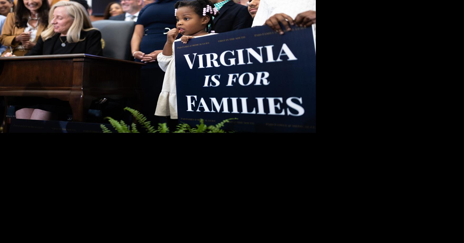 Photos: Gov. Spanberger signs paid family and medical leave bill