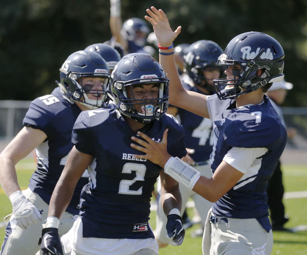 Pat Taylor scores three touchdowns, picks off two passes in Freeman's