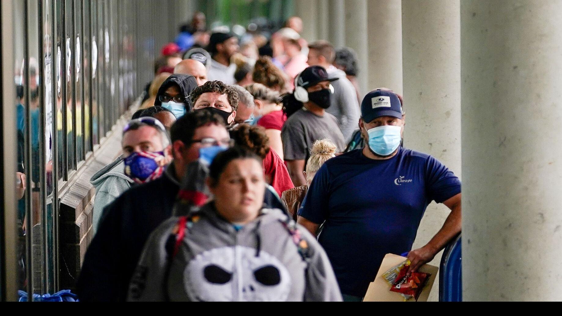 Jobless claims rise as omicron spreads in the United States