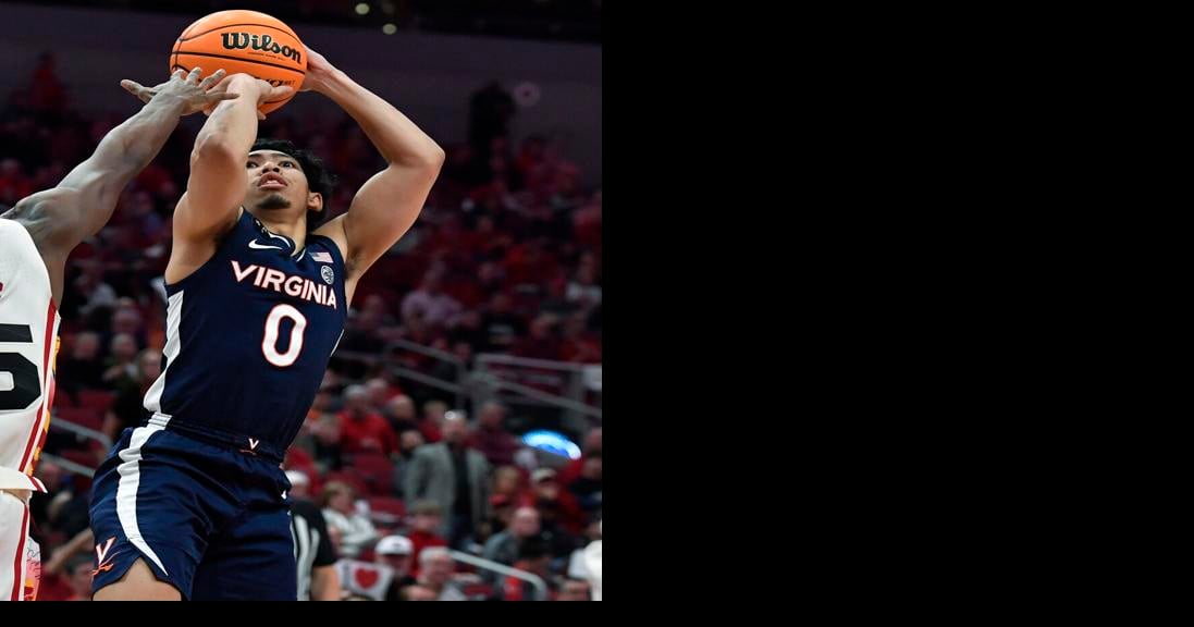 LOUISVILLE, KY - FEBRUARY 15: Virginia Cavaliers guard Kihei Clark (0)  handles the ball during a college basketball game against the Louisville  Cardinals on February 15, 2023 at KFC Yum! Center in