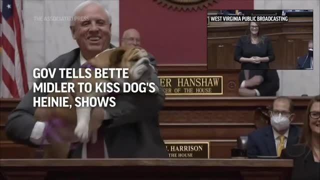 Gov tells Bette Midler to kiss dog's heinie, shows