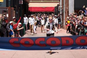 Rachel Entrekin crosses the finish line at the Cocodona 250 Mile in 56 hours, 9 minutes, and 48 seconds, a new course record.