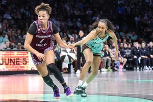 Jun 3, 2026; Brooklyn, New York, USA; New York Liberty guard Rebekah Gardner (7) steals the ball from Toronto Tempo guard Kiki Rice (1) in the first quarter at Barclays Center. Mandatory Credit: Wendell Cruz-Imagn Images
