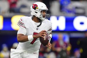 Jan 4, 2026; Inglewood, California, USA; Arizona Cardinals quarterback Jacoby Brissett (7) rolls out against the Los Angeles Rams during the second half at SoFi Stadium. Mandatory Credit: Gary A. Vasquez-Imagn Images
