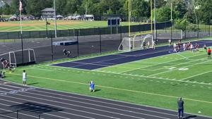 Kellam's Caroline Hensler heads home for Knights second goal in Class 5 girls soccer semifinal vs. Mills Godwin