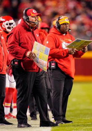 Kansas City Chiefs head coach Andy Reid (left) and offensive coordinator Eric Bieniemy look on from the sideline during a 2021 game against the New York Giants at GEHA Field at Arrowhead Stadium in Kansas City, Missouri.