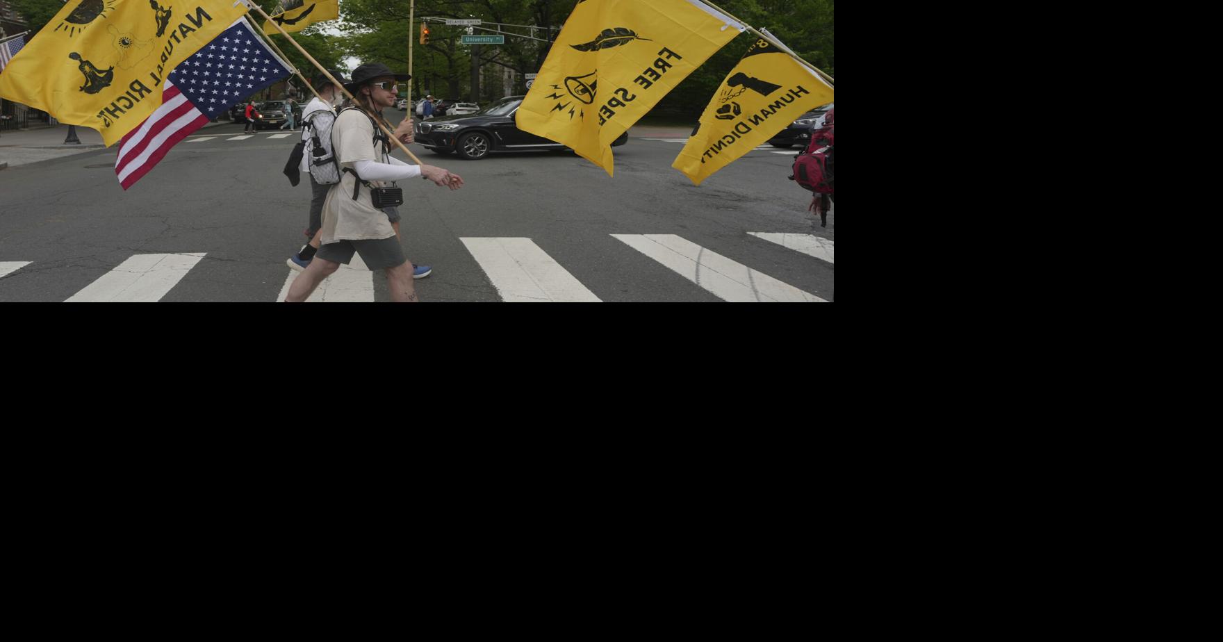 Quakers march against Trump's crackdown on immigrants, carrying on long ...