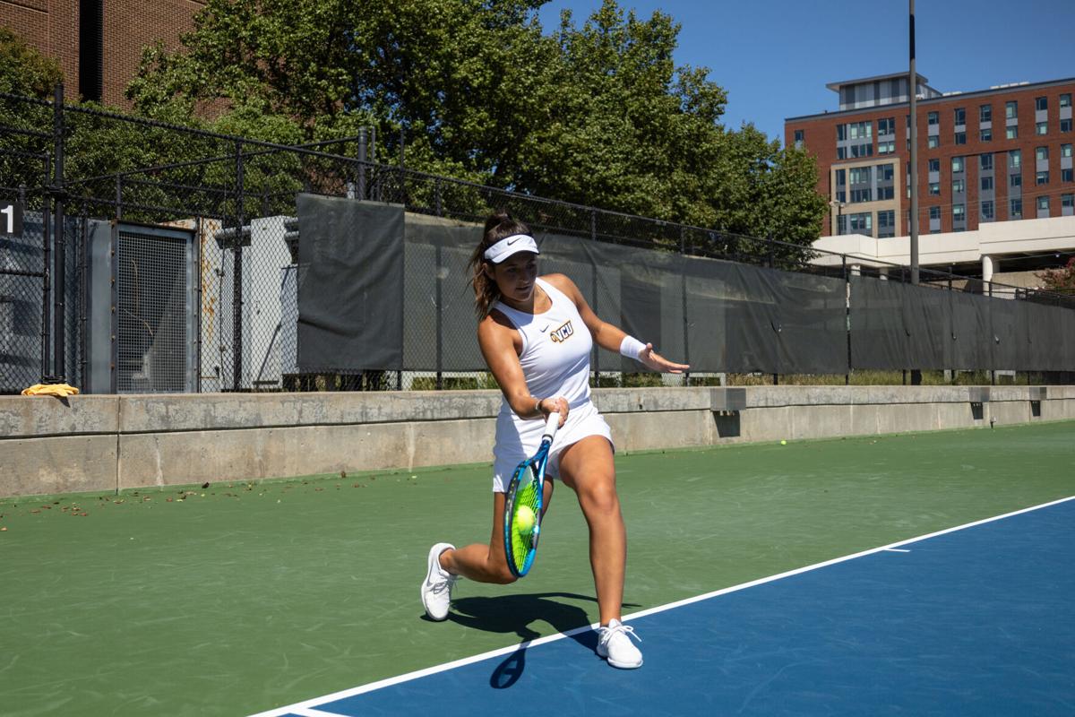 Sorkin_Nina Forehand ball hitting racket.jpg