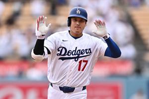 Los Angeles Dodgers two-way player Shohei Ohtani (17) celebrates after hitting a solo home run against the Arizona Diamondbacks during the first inning at Dodger Stadium in Los Angeles, California, on July 12, 2026.