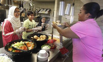 members of the Muslim community served meals at the Salvation Army in Richmond in July