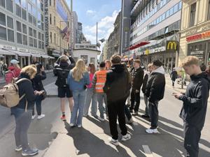 Tourists take photos in front a guardhouse replica at Checkpoint Charlie, the famous border crossing point between the U.S.- occupied sector of West Berlin and the Soviet’ s East Berlin.