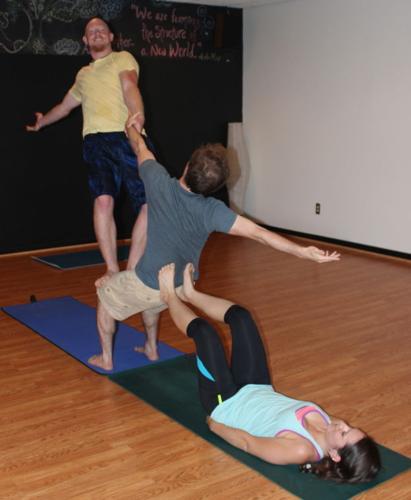 three people yoga poses