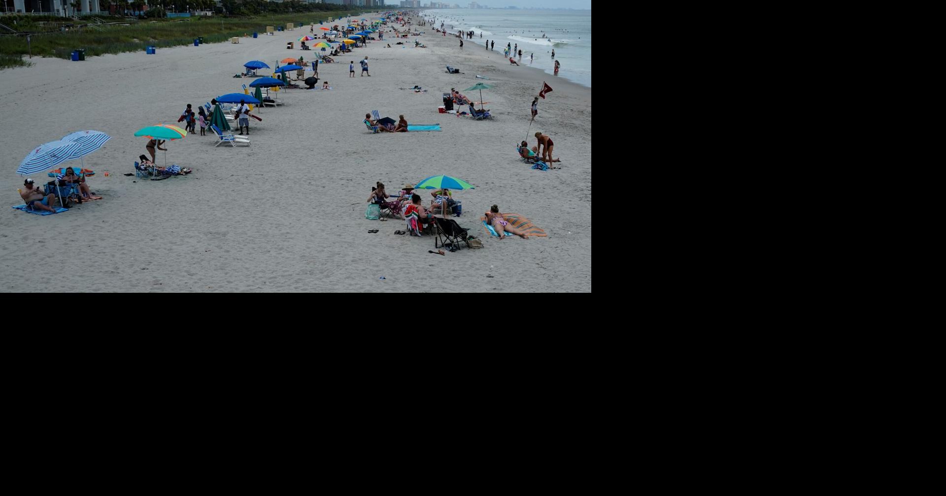 Umbrella swept by wind kills woman at South Carolina beach