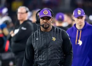 Minnesota Vikings defensive coordinator Brian Flores against the Los Angeles Rams during a 2025 NFC wild card game at State Farm Stadium in Glendale, Arizona.